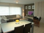 In een moderne residentie op nauwelijks 50m. van het strand, bieden wij u dit prachtappartement aan; ingericht met de hulp van een binnenhuisarchitect. Als eigenaar van dit luxueus gemeubeld appartement beschikt u over een ruime hoek-woonkamer met terras, volledig ingerichte keuken, inkomhall met toilet, 3 mooie slaapkamers met ingebouwde kasten, 2 badkamers, ... In deze residentie bieden wij u tevens een ruime garagebox te koop aan . De hoogwaardige afwerking (o.a. natuurstenen vloer, designverlichting, ...), de uiterst complete uitrusting (maatkasten, wasmachine en droogtrommel, ...) en de absolute nieuwstaat van dit appartement maken het plaatje compleet! (14/040)